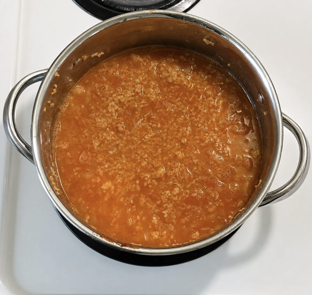 Boiling the Tomato Bulgar Pilaf mixture